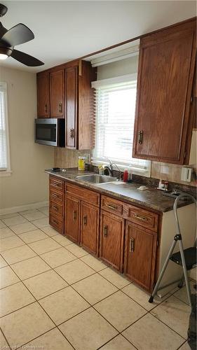 513 Queensway Road W, Simcoe, ON - Indoor Photo Showing Kitchen With Double Sink