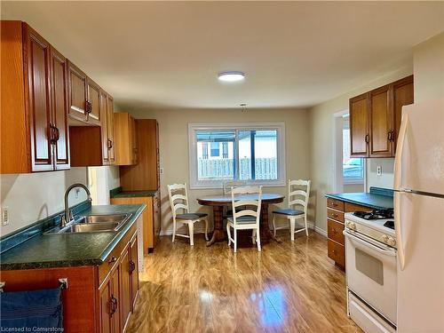 62 Decou Road, Simcoe, ON - Indoor Photo Showing Kitchen With Double Sink