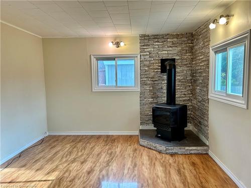 62 Decou Road, Simcoe, ON - Indoor Photo Showing Other Room With Fireplace