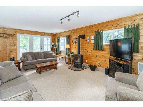 143 South Drive, Huntsville, ON - Indoor Photo Showing Living Room With Fireplace