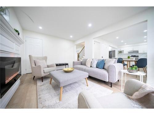 42 Falls Crescent, Simcoe, ON - Indoor Photo Showing Living Room With Fireplace