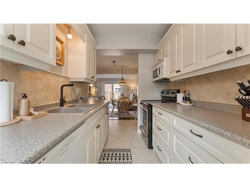 14 Montclair Crescent, Simcoe, ON - Indoor Photo Showing Kitchen With Double Sink