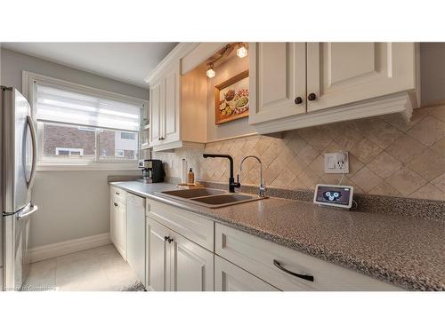 14 Montclair Crescent, Simcoe, ON - Indoor Photo Showing Kitchen With Double Sink