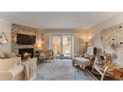 14 Montclair Crescent, Simcoe, ON - Indoor Photo Showing Living Room With Fireplace