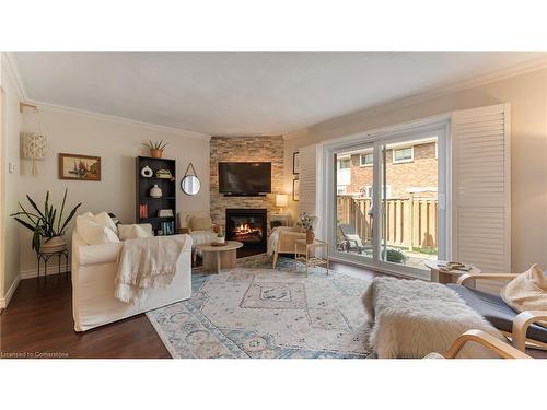 14 Montclair Crescent, Simcoe, ON - Indoor Photo Showing Living Room With Fireplace