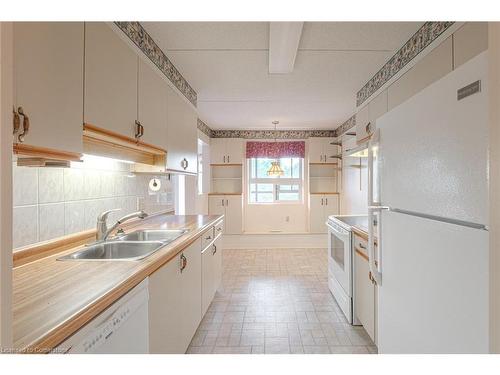 604-11 Mill Pond Court, Simcoe, ON - Indoor Photo Showing Kitchen With Double Sink