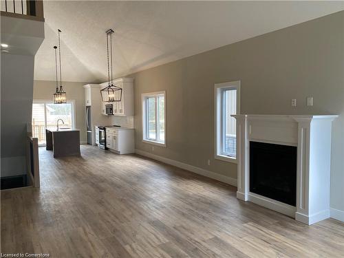 28-744 Nelson Street W, Port Dover, ON - Indoor Photo Showing Living Room With Fireplace