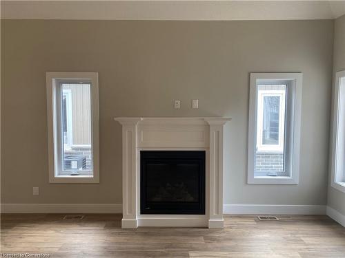 28-744 Nelson Street W, Port Dover, ON - Indoor Photo Showing Other Room With Fireplace