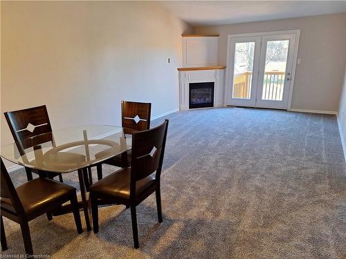 2-510 Queensway W, Simcoe, ON - Indoor Photo Showing Other Room With Fireplace