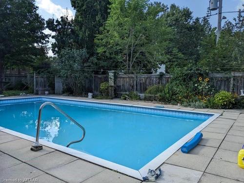 263 Light Street, Woodstock, ON - Outdoor With In Ground Pool With Backyard