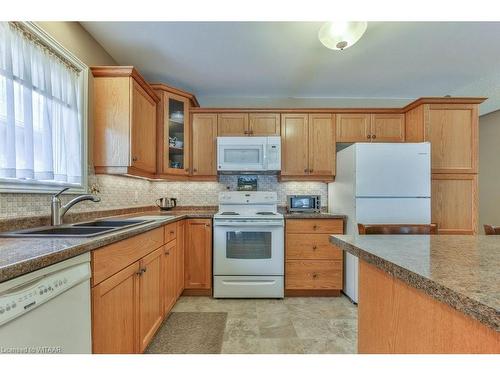 23 Hogarth Drive, Tillsonburg, ON - Indoor Photo Showing Kitchen With Double Sink