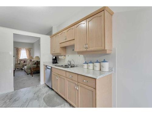 8-87 King Street, Tillsonburg, ON - Indoor Photo Showing Kitchen With Double Sink