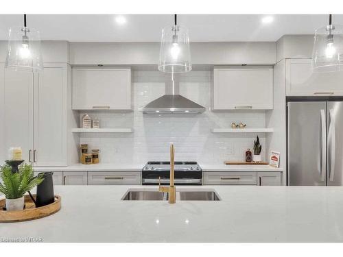 107-361 Quarter Town Line, Tillsonburg, ON - Indoor Photo Showing Kitchen With Stainless Steel Kitchen With Upgraded Kitchen