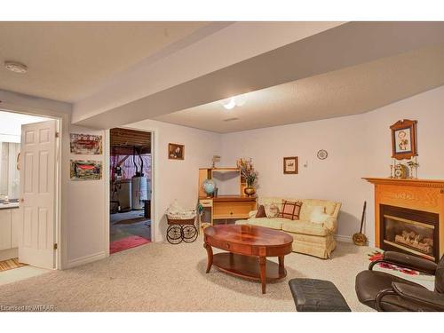 124 Wilson Avenue, Tillsonburg, ON - Indoor Photo Showing Living Room With Fireplace