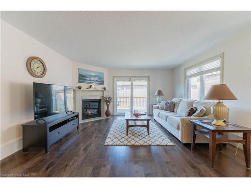 4 Hollier Drive, Tillsonburg, ON - Indoor Photo Showing Living Room With Fireplace