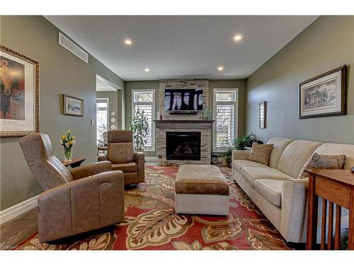 82 Graydon Drive, Mount Elgin, ON - Indoor Photo Showing Living Room With Fireplace