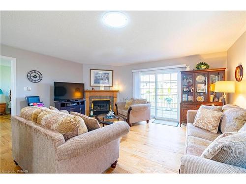 202 Baldwin Street, Tillsonburg, ON - Indoor Photo Showing Living Room With Fireplace
