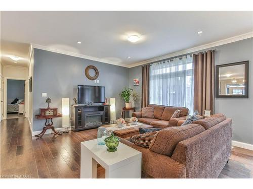 39 Graydon Drive, Mount Elgin, ON - Indoor Photo Showing Living Room With Fireplace