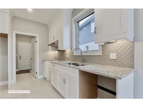 19 Sycamore Drive, Tillsonburg, ON - Indoor Photo Showing Kitchen With Double Sink