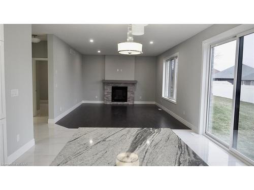 12 Sycamore Drive, Tillsonburg, ON - Indoor Photo Showing Living Room With Fireplace