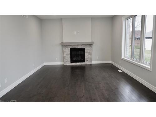 12 Sycamore Drive, Tillsonburg, ON - Indoor Photo Showing Living Room With Fireplace