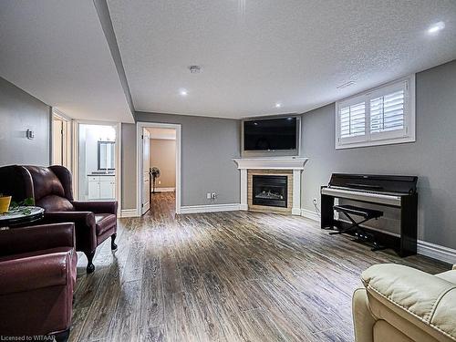 19 Cynthia Avenue, Mount Elgin, ON - Indoor Photo Showing Living Room With Fireplace