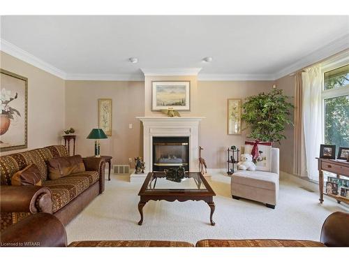 57749 Carson Line, Tillsonburg, ON - Indoor Photo Showing Living Room With Fireplace