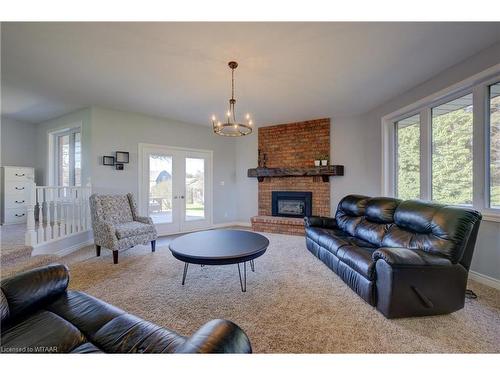 144 Dover Street, Otterville, ON - Indoor Photo Showing Living Room With Fireplace
