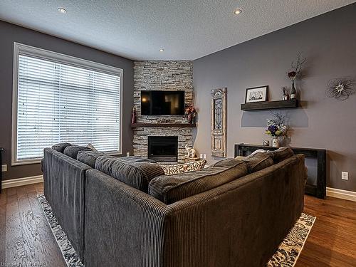231 Dieppe Drive, Woodstock, ON - Indoor Photo Showing Living Room With Fireplace