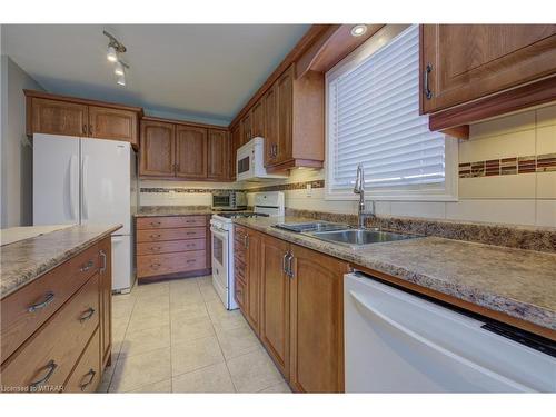 54 Delong Drive, Norwich, ON - Indoor Photo Showing Kitchen With Double Sink