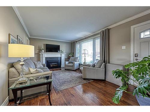 98 Lisgar Avenue, Tillsonburg, ON - Indoor Photo Showing Living Room With Fireplace