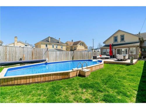 599 Peel Street, Woodstock, ON - Outdoor With In Ground Pool With Backyard