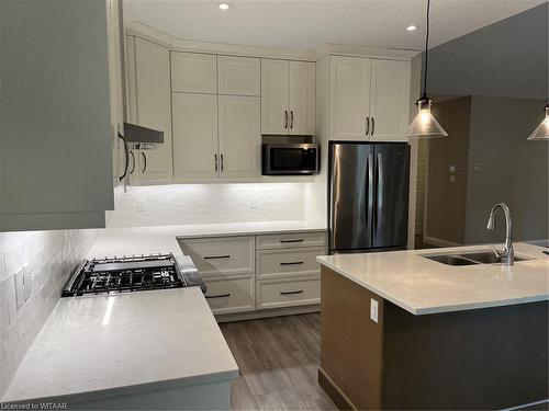 303-5 Wood Haven Dr, Tillsonburg, ON - Indoor Photo Showing Kitchen With Double Sink With Upgraded Kitchen