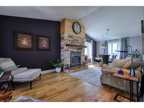 244 Falcon Drive, Woodstock, ON - Indoor Photo Showing Living Room With Fireplace