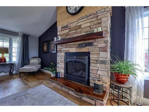 244 Falcon Drive, Woodstock, ON - Indoor Photo Showing Living Room With Fireplace