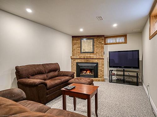 303 Macdonald Drive, Woodstock, ON - Indoor Photo Showing Basement With Fireplace
