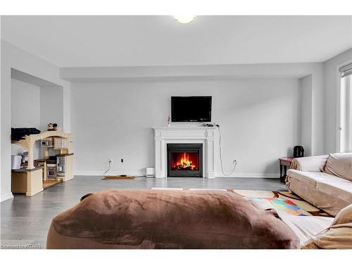 69 Mackay Drive, Woodstock, ON - Indoor Photo Showing Living Room With Fireplace
