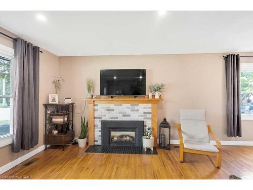 26 Glendale Drive, Tillsonburg, ON - Indoor Photo Showing Living Room With Fireplace