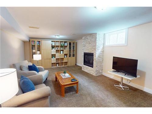 807 Stonegate Drive, Woodstock, ON - Indoor Photo Showing Living Room With Fireplace