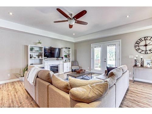 2597 Nixon Road, Simcoe, ON - Indoor Photo Showing Living Room With Fireplace