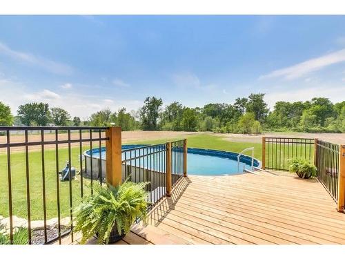 2597 Nixon Road, Simcoe, ON - Outdoor With Above Ground Pool With Deck Patio Veranda