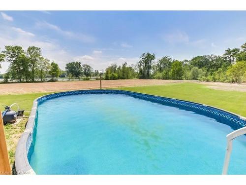 2597 Nixon Road, Simcoe, ON - Outdoor With Above Ground Pool With Backyard