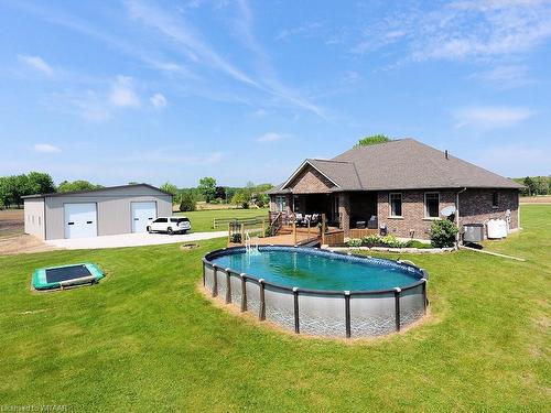 2597 Nixon Road, Simcoe, ON - Outdoor With Above Ground Pool With Backyard