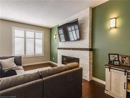 16 Hartfield Street, Ingersoll, ON - Indoor Photo Showing Living Room With Fireplace