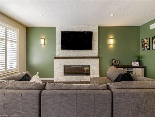 16 Hartfield Street, Ingersoll, ON - Indoor Photo Showing Living Room With Fireplace