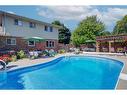 20 Devon Court, Tillsonburg, ON  - Outdoor With In Ground Pool With Deck Patio Veranda With Backyard 