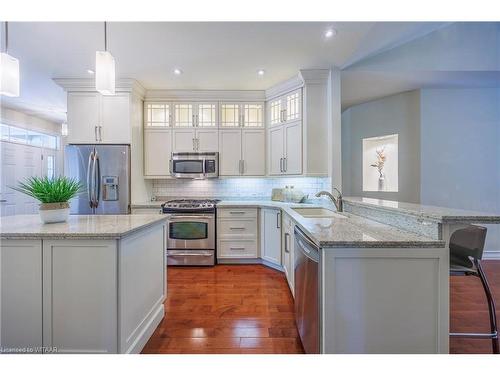 102-5 Wood Haven Drive, Tillsonburg, ON - Indoor Photo Showing Kitchen With Upgraded Kitchen