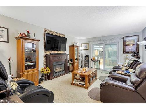 18 Hawkins Crescent, Tillsonburg, ON - Indoor Photo Showing Living Room With Fireplace