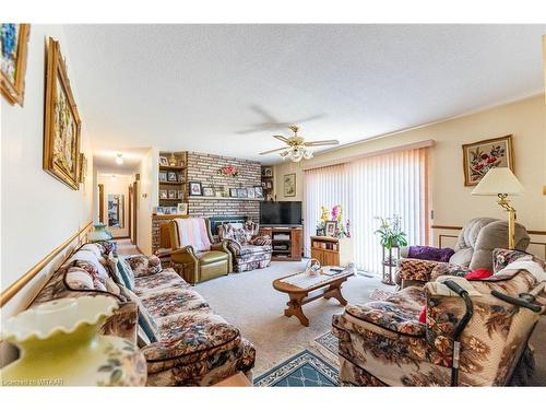 17 Demeyere Avenue, Tillsonburg, ON - Indoor Photo Showing Living Room With Fireplace