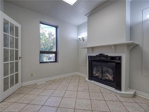 590 Adelaide Street, Woodstock, ON - Indoor With Fireplace